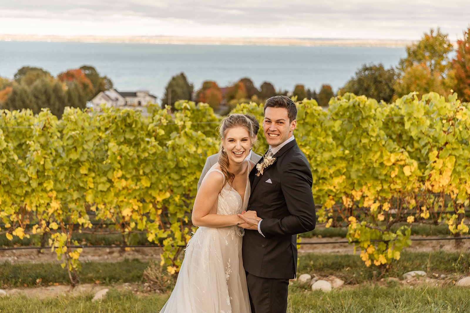 bride and groom laughing at traverse city Northern Michigan elopement