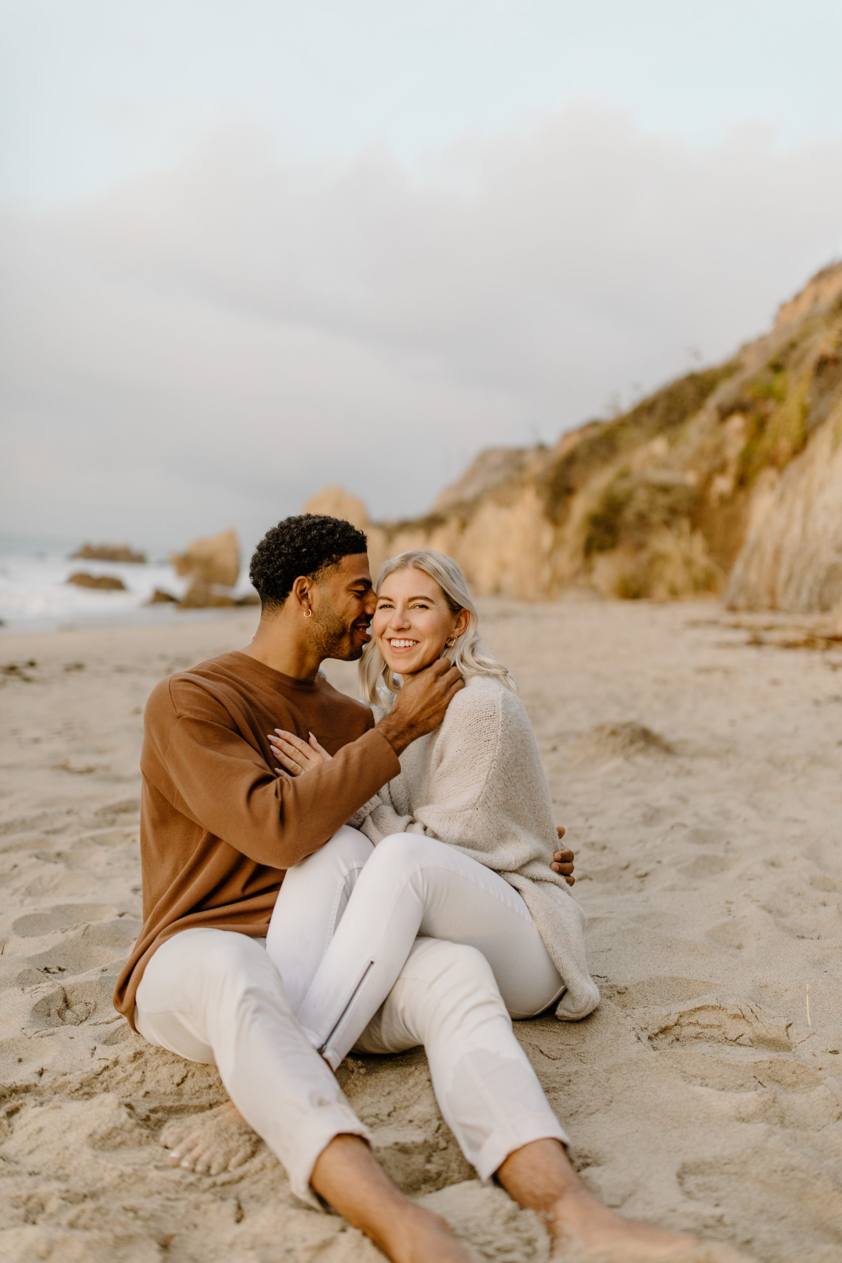 couple kissing on the beach in California