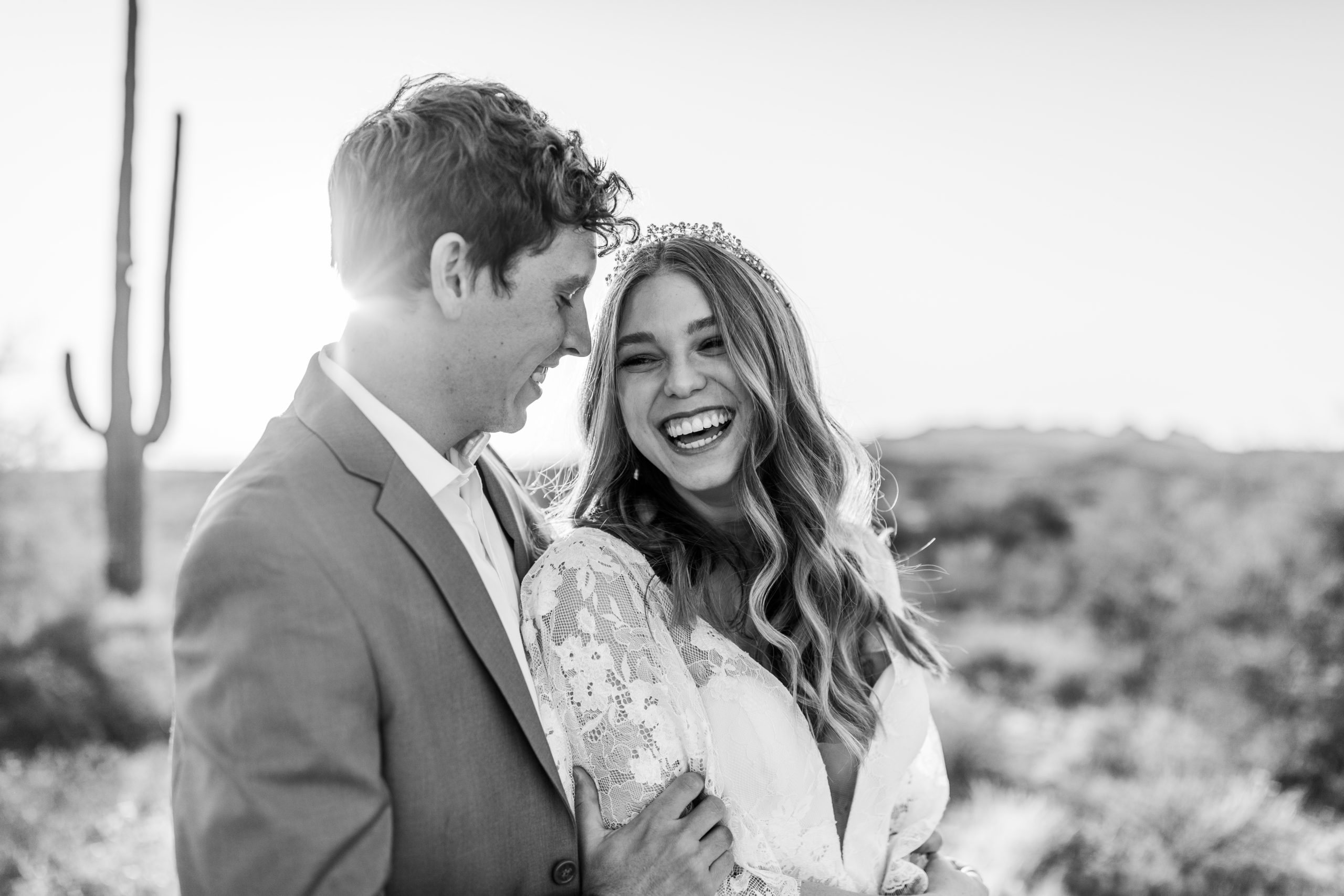 bride and groom smiling at Arizona desert elopement wedding