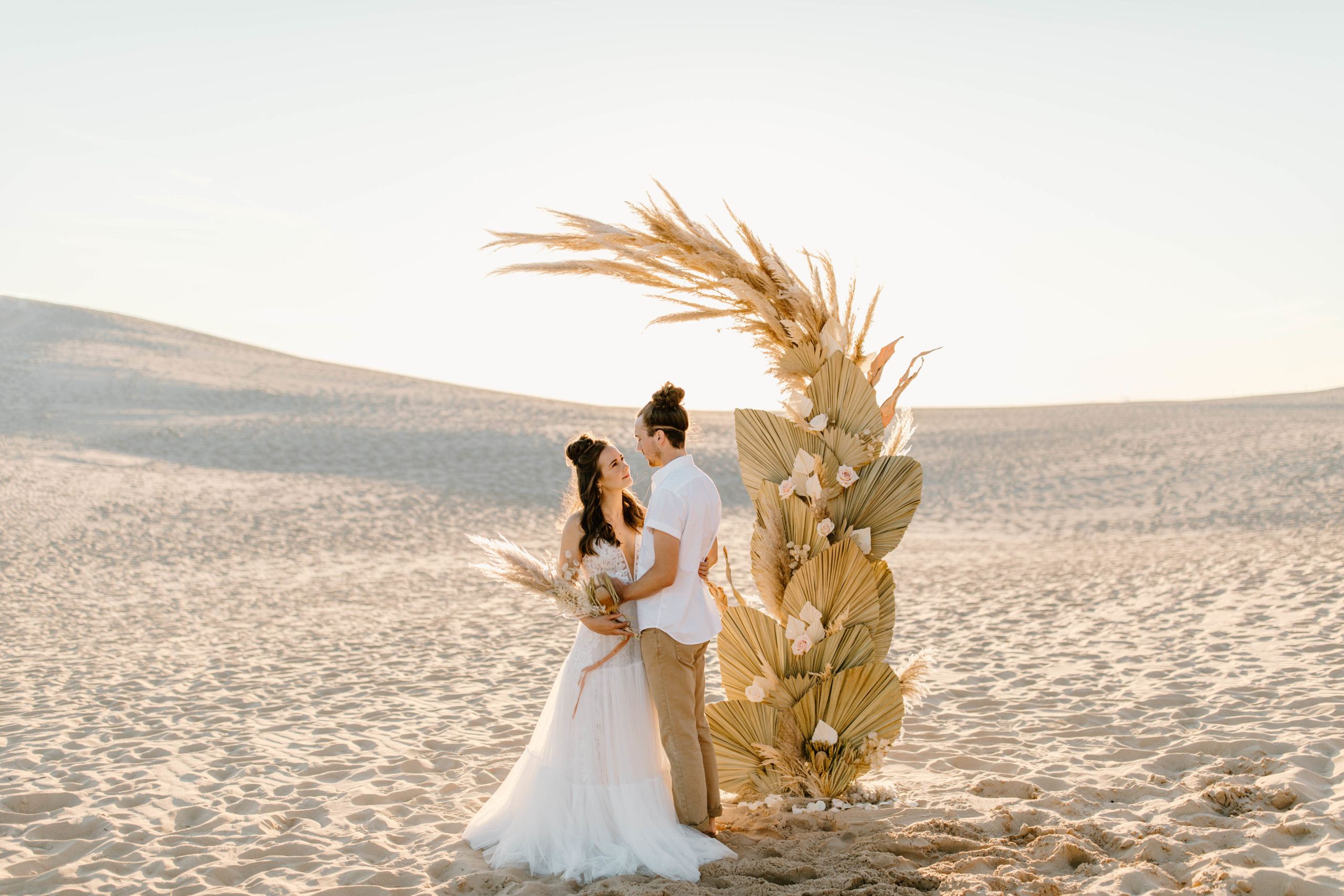 Boho Sand Dune Elopement in front of Palms and Pampas Grass