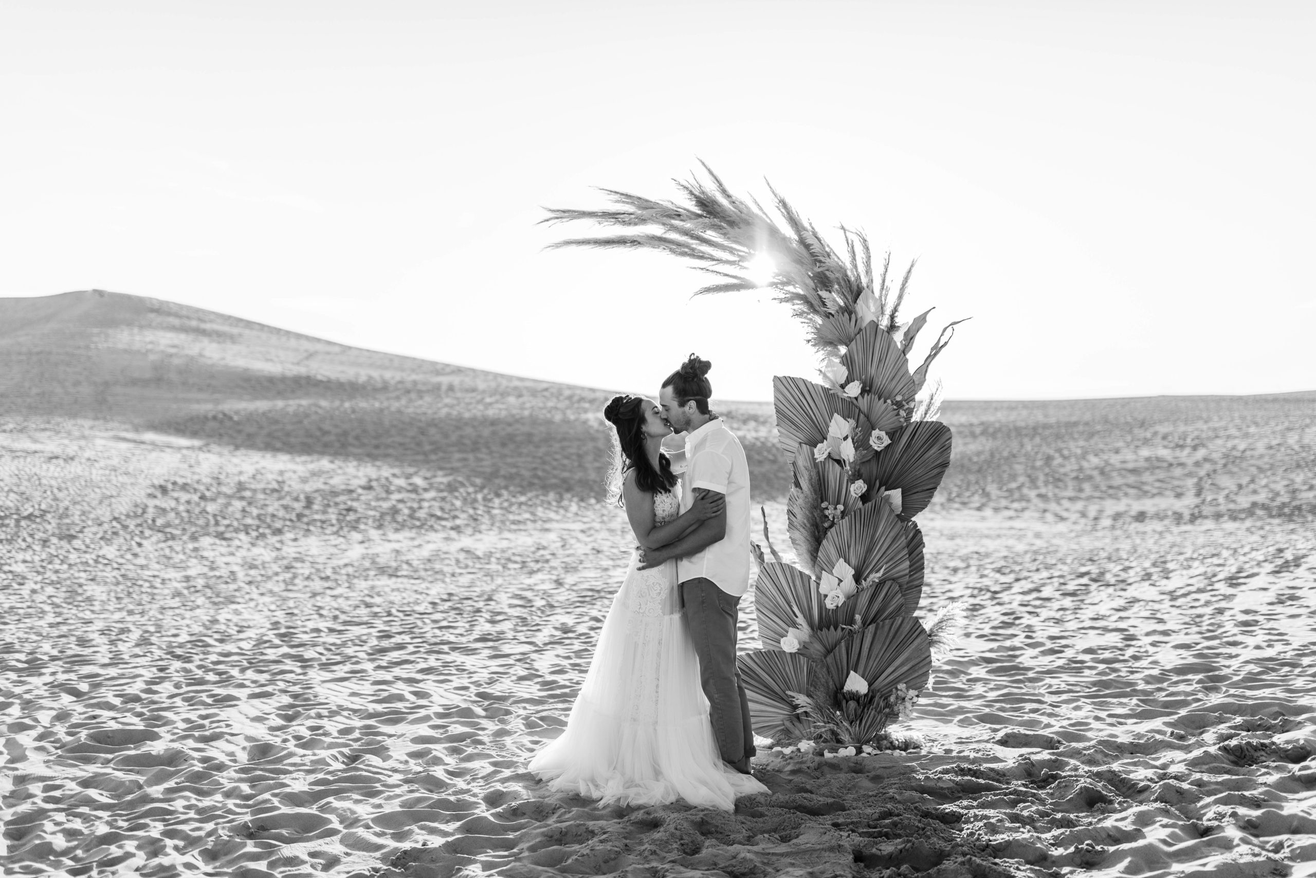 Boho Sand Dune Elopement in Michigan with Palms and Pampas Grass