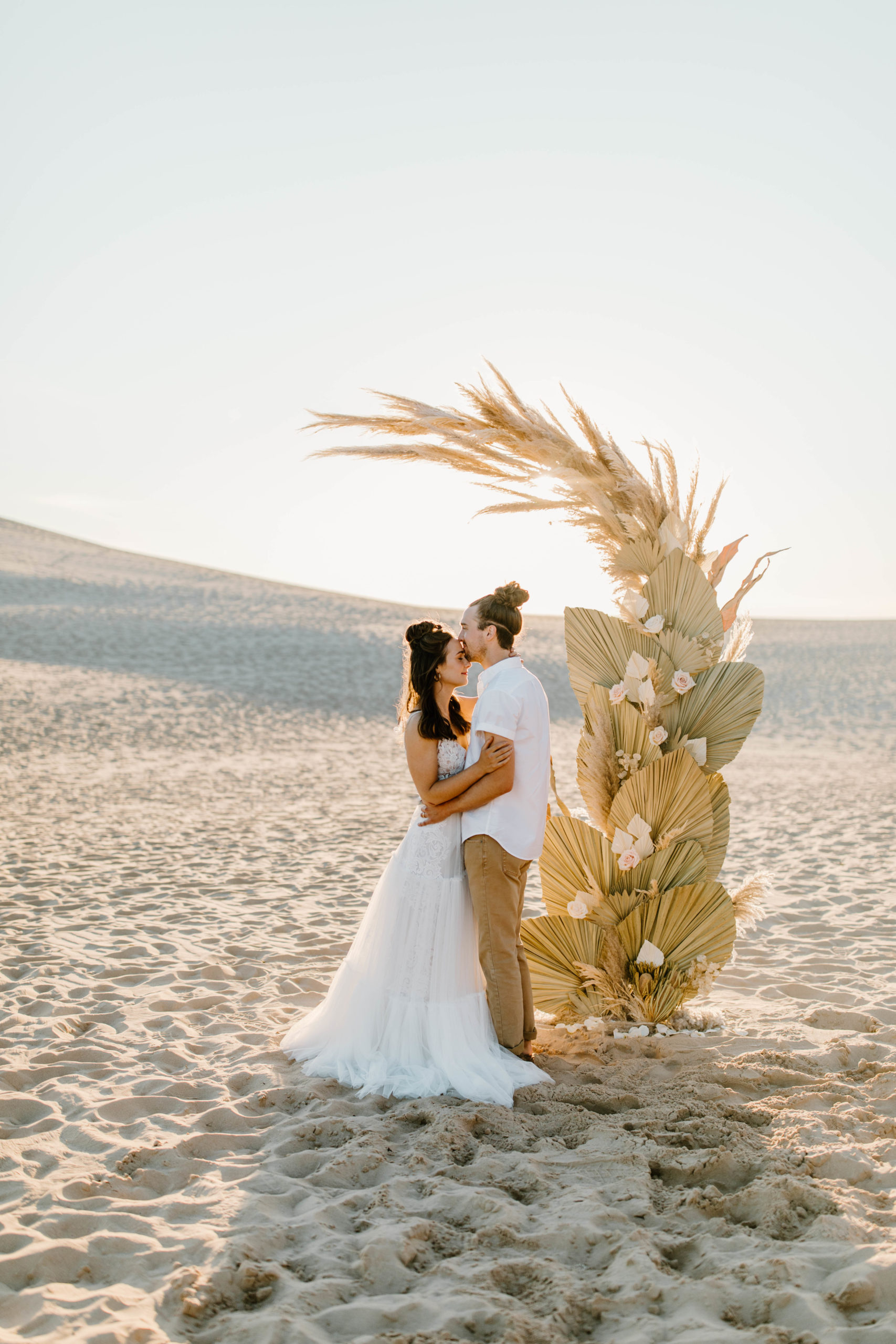 Boho Sand Dune Elopement in front of Palms and Pampas Grass