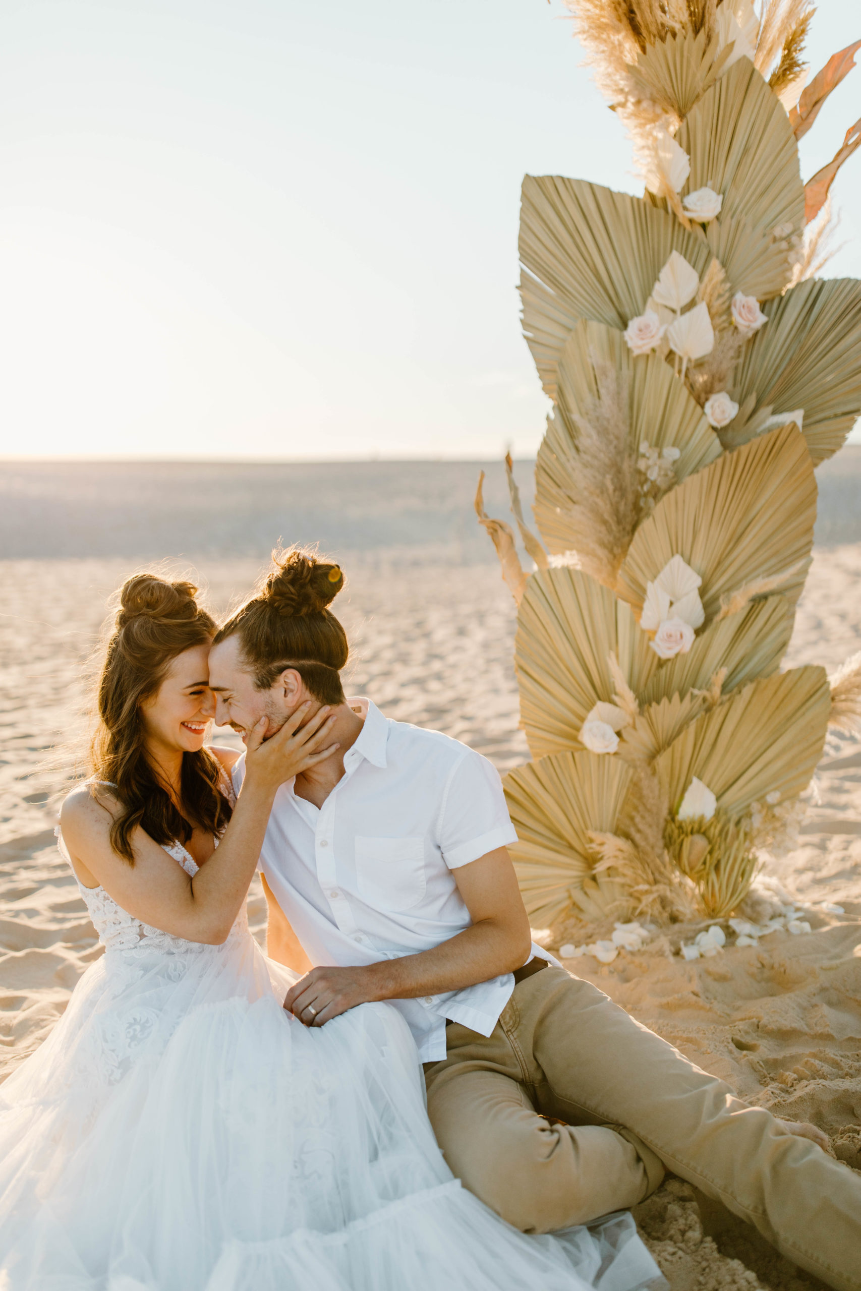 Michigan Elopement in sand dunes with candid bride and groom