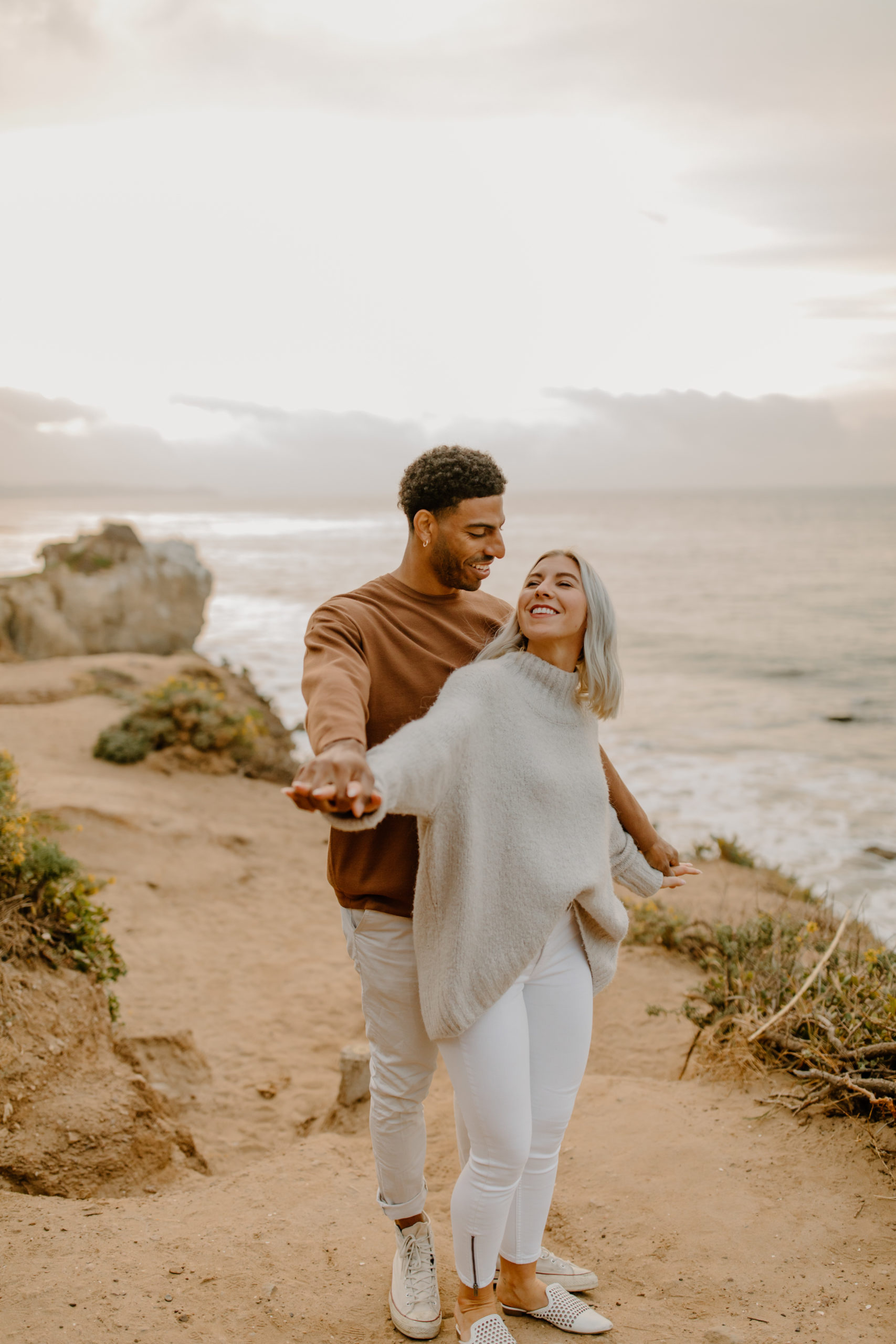 sunrise engagement photo session on trail by the ocean in Malibu California