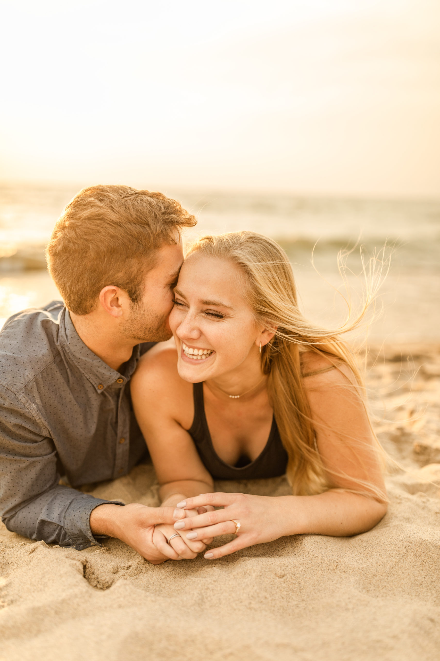 couple engagement photoshoot session at beach on Lake Michigan