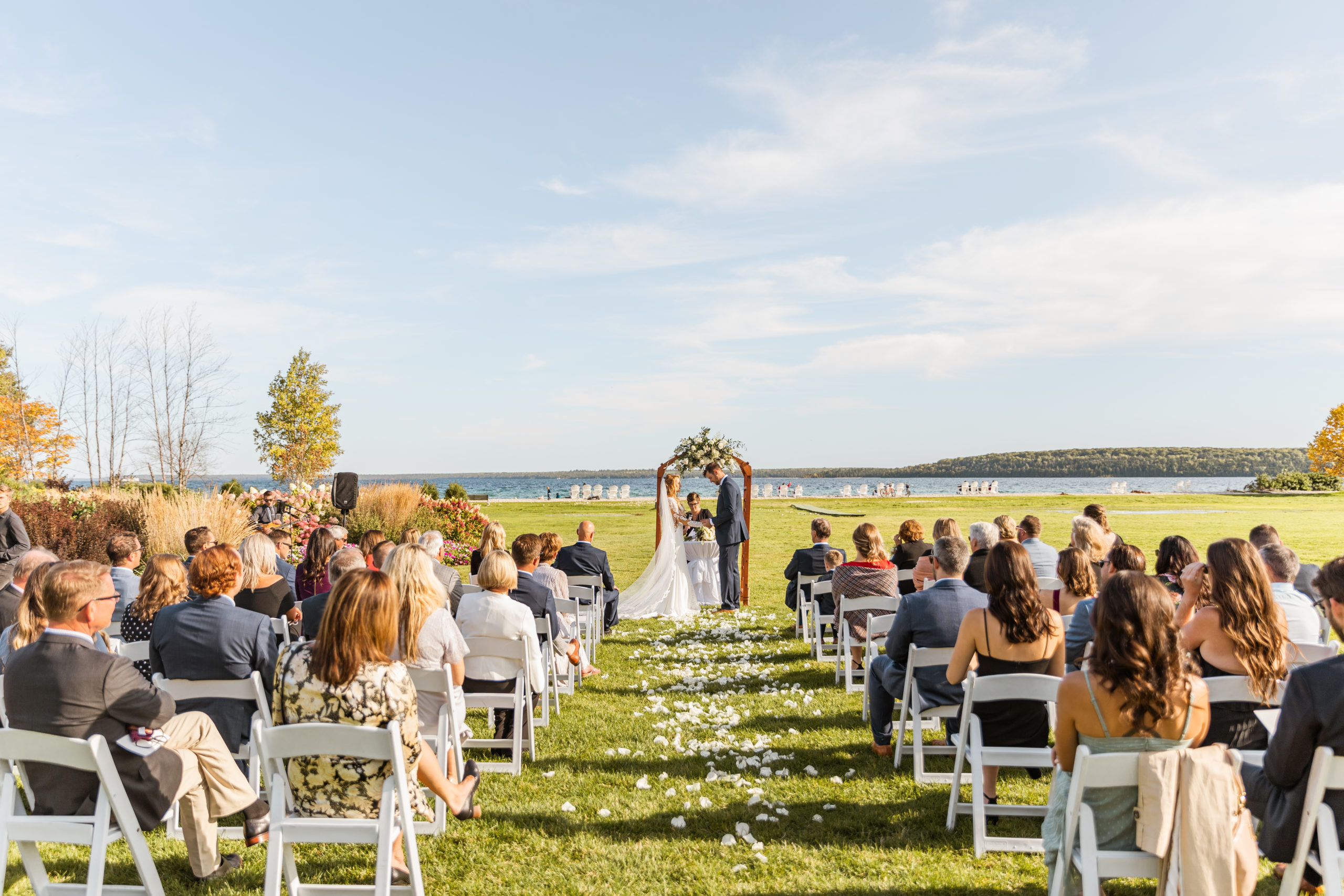 Mackinac Island wedding ceremony on lawn in front of Lake Michigan