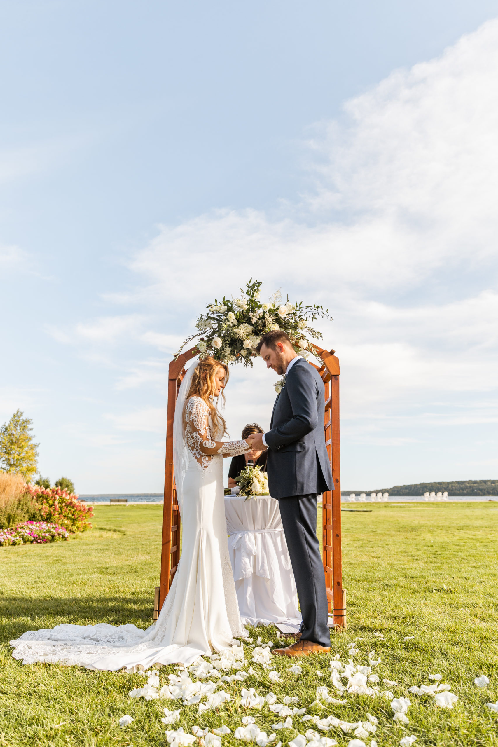 Mackinac Island wedding ceremony on lawn in front of Lake Michigan