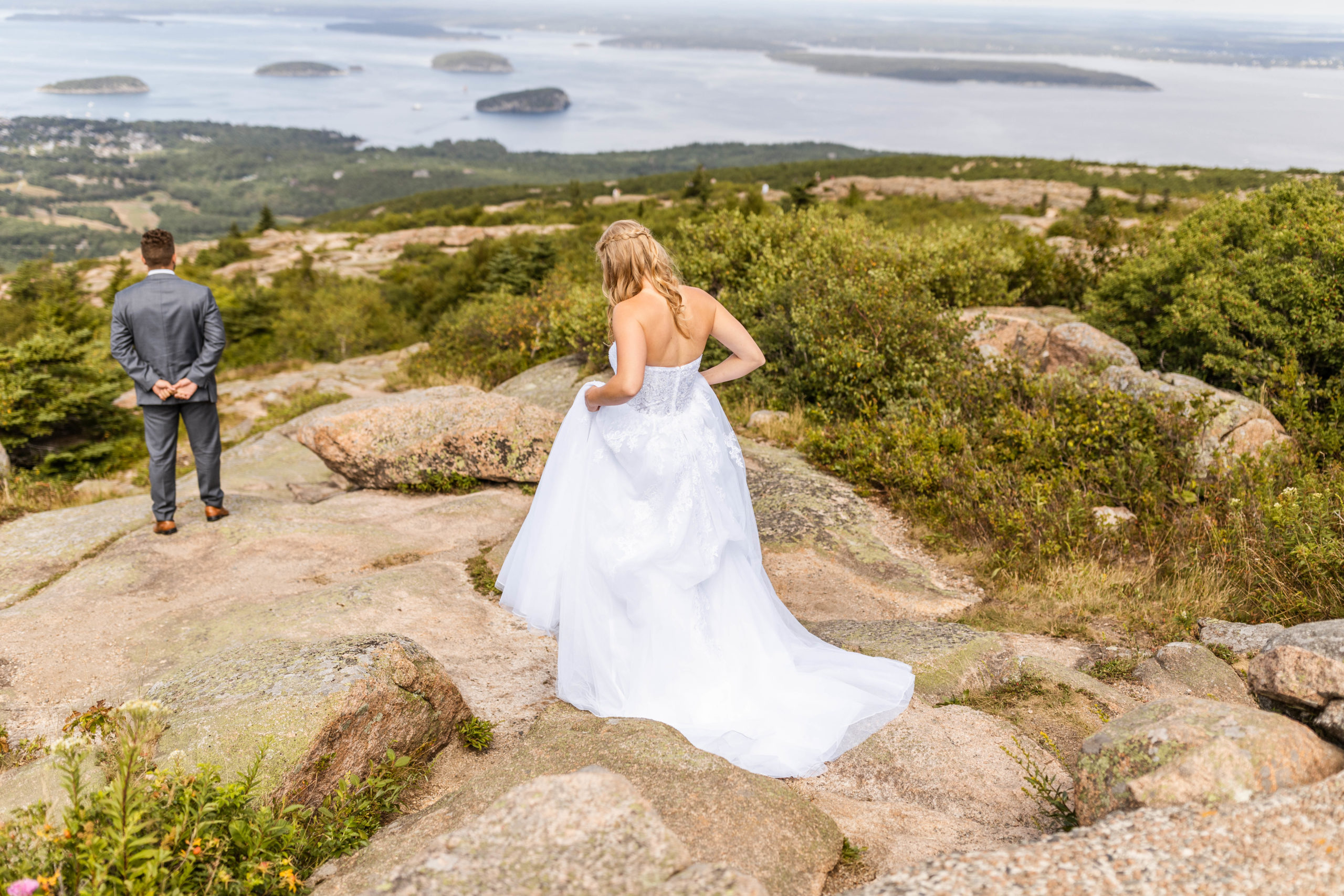 bride and groom's first look at Acadia National Park Elopement