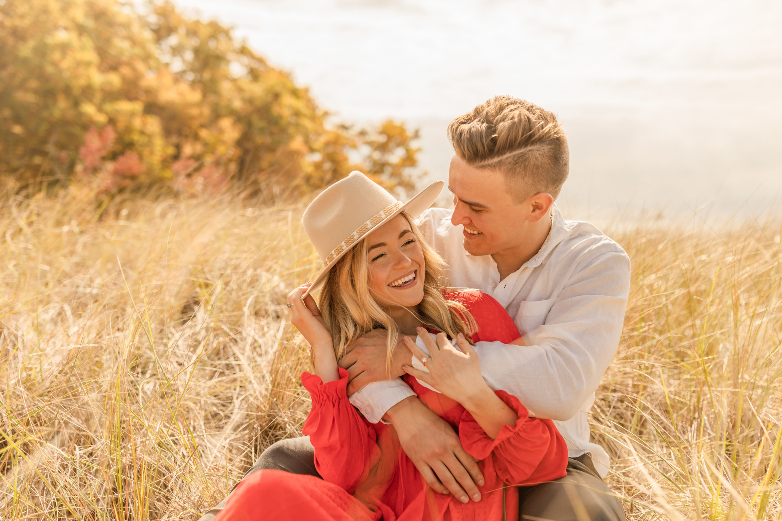 couple's boho engagement session on the beach in Michigan
