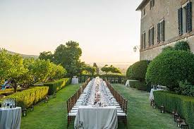 wedding reception in garden of castle in Tuscany