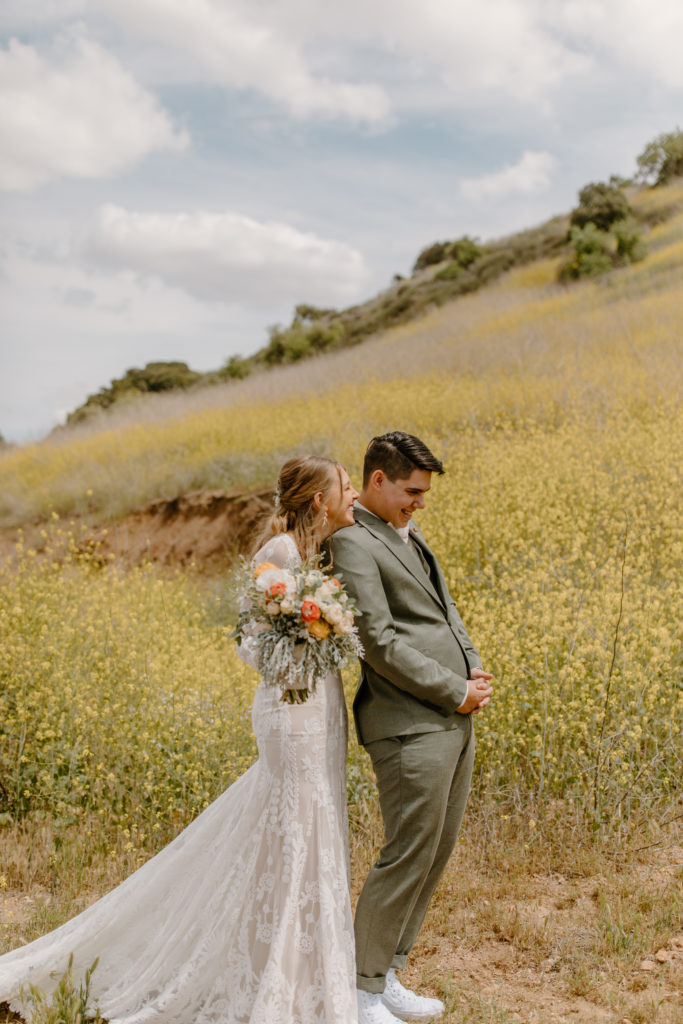 Wedding Day First Look Photos in flower field California