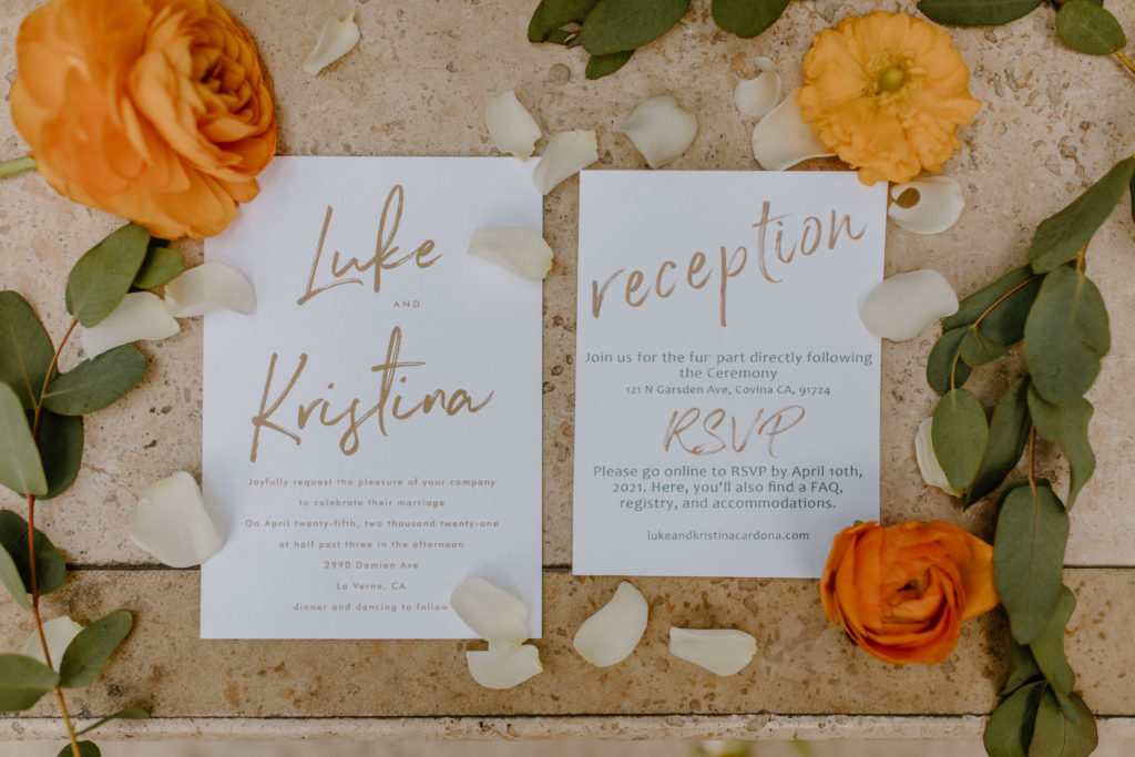 Simple calligraphy wedding invites paper suite with rust flower detail photos
