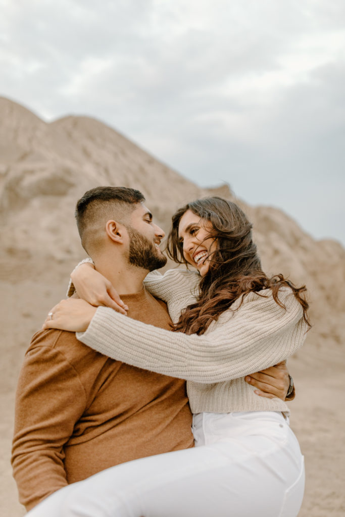 Gravel Yard Mountain Minimalistic Engagement Photos Neutral Outfits