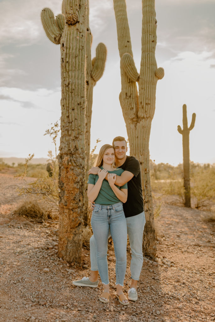 Couples photos in desert with cactus in Arizona