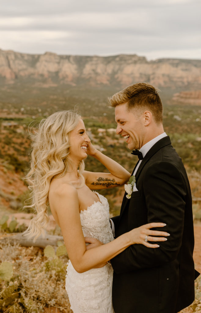 Candid Bride Groom Laughing Wedding Photos Sedona Arizona Mountains Sunset Golden Hour Photography