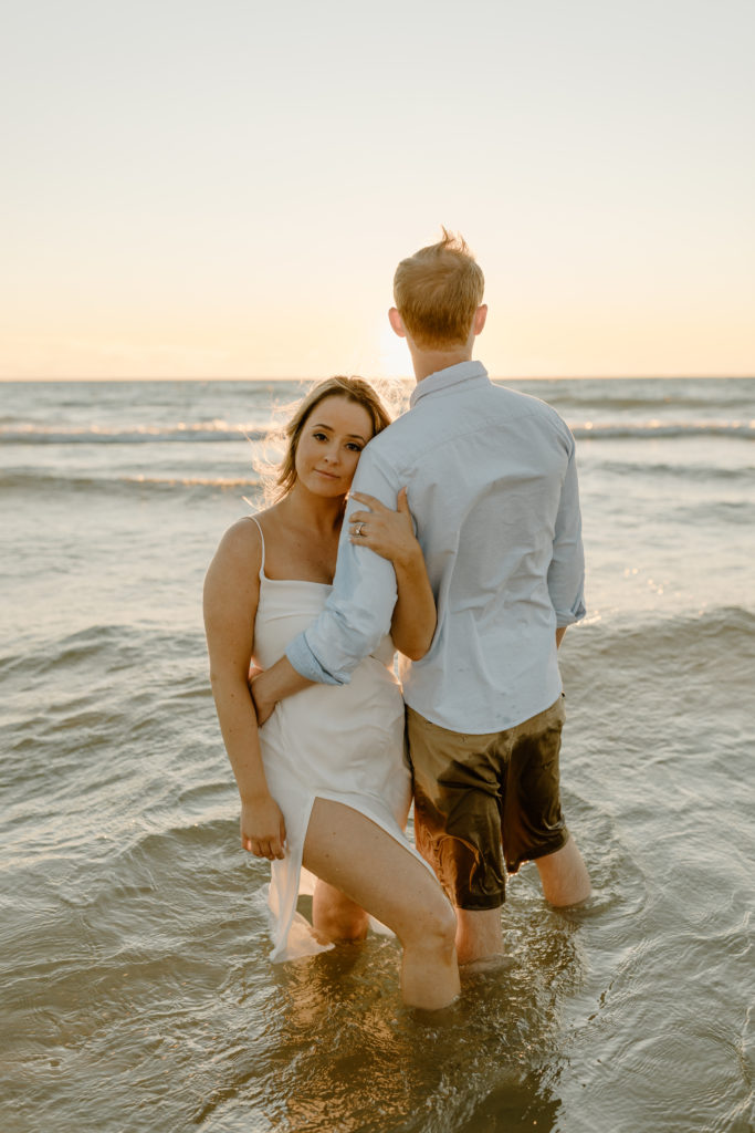 Michigan Photographer Engagement Photos in the Water Lake Ocean
