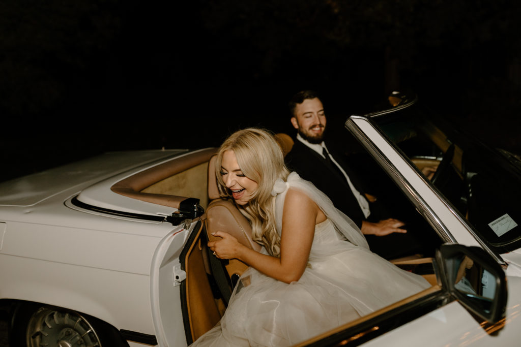 Vintage white convertible car wedding photos bride groom