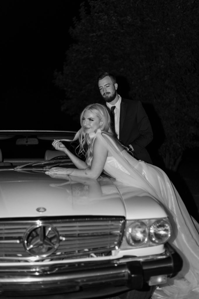 Vintage white convertible wedding photos getaway car