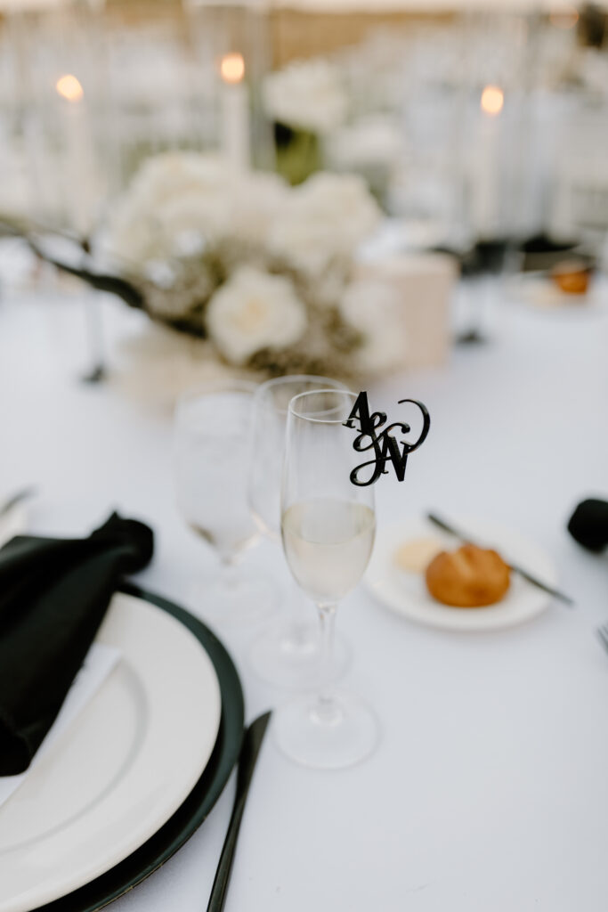 wedding reception decor details champagne glass with custom logo