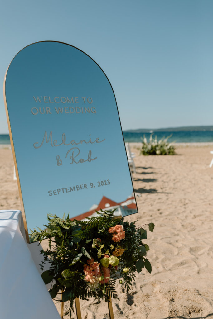 Mirror wedding sign on the beach